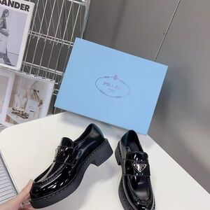Prada Women's Glossy Black Loafers